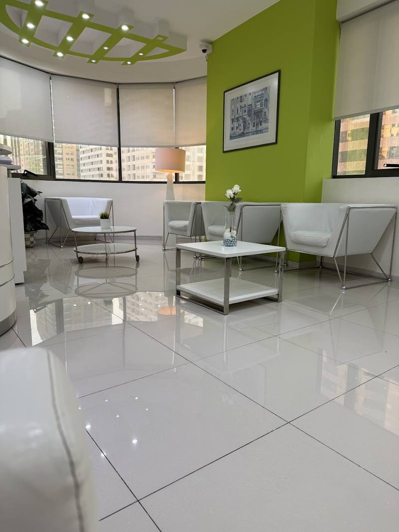 Waiting area with green feature wall
