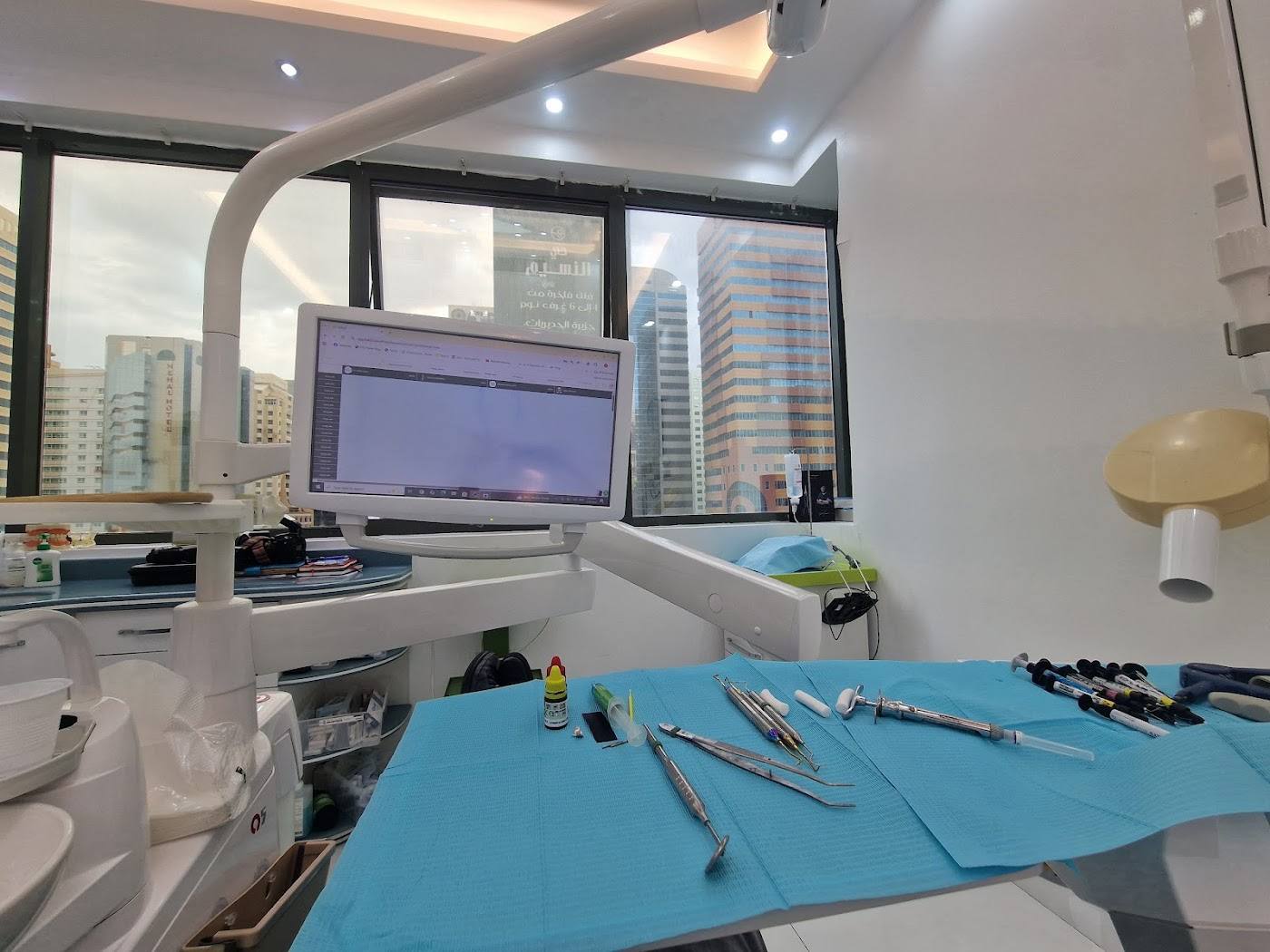 A treatment room at Diamond Dental Clinic, with windows over Hamdan Street